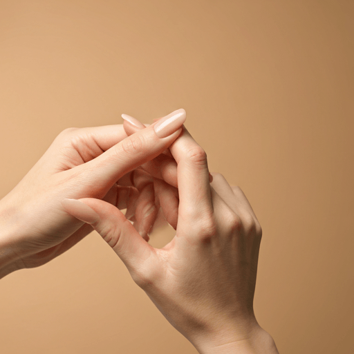 A close-up of professional manicured hands